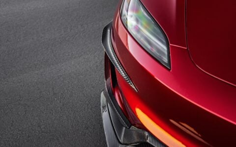 2024+ Tesla Model 3 Performance with Carbon Fiber Front Aero Kit parts like Front Canards, Lip Spoiler and Racing Diffuser attached.