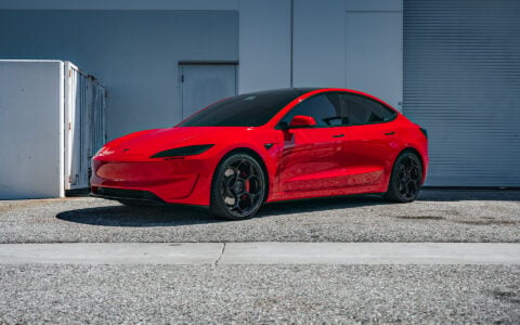 Bright Red 2024 Tesla Model 3 Performance 20 inch UP-05 Wheels in Gloss Black