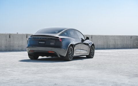 Stealth Grey 2024 Tesla Model 3 Performance with OEM Suspension on 19 Inch UP-03 Forged Wheels in Satin Titanium