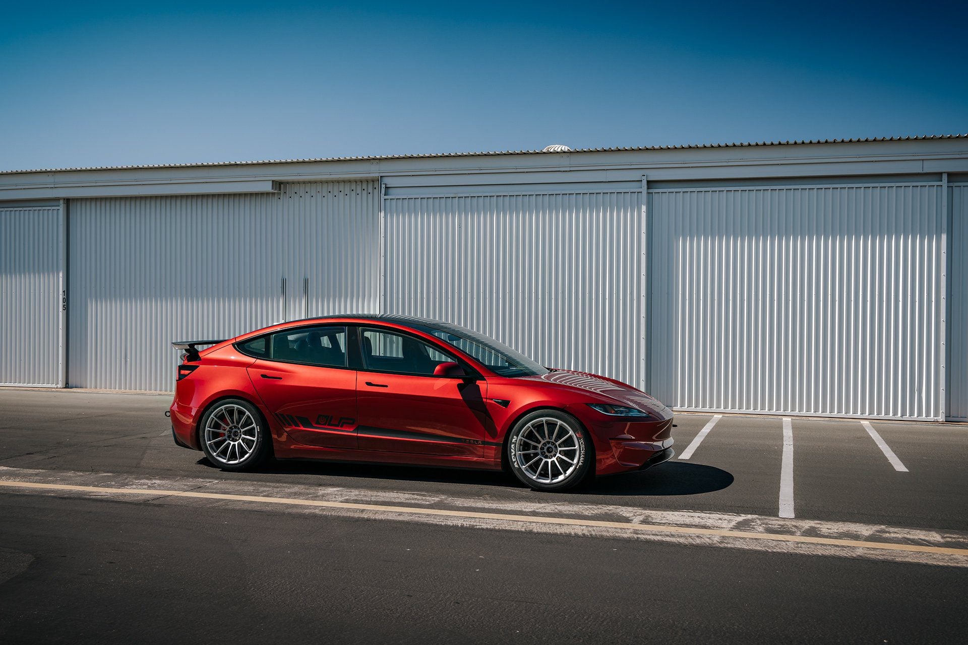 Ultra Red Tesla Model 3 Performance – UP-03 Pikes Peak Spec Forged Wheels in Custom Finish