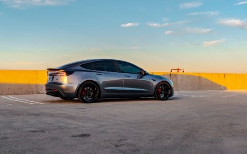 Quicksilver Tesla Model 3 Performance parked with UP-05 Forged Wheels.