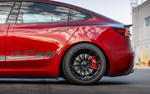 UP-03 Forged Wheels in Gloss Black on Tesla Model 3 Performance, wrapped with Yokohama ADVAN tires, perfect for high-speed cornering.