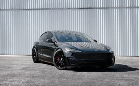 Tesla Model 3 Performance parked outdoors featuring UP X BBS Flugplatz Wheels in Gloss Black by Unplugged Performance with Yokohama Advan Apex tires.