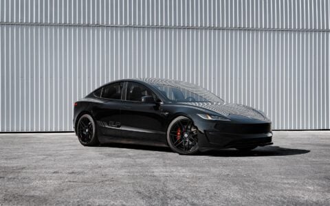Tesla Model 3 Performance parked outdoors featuring UP X BBS Flugplatz Wheels in Gloss Black by Unplugged Performance with Yokohama Advan Apex tires.