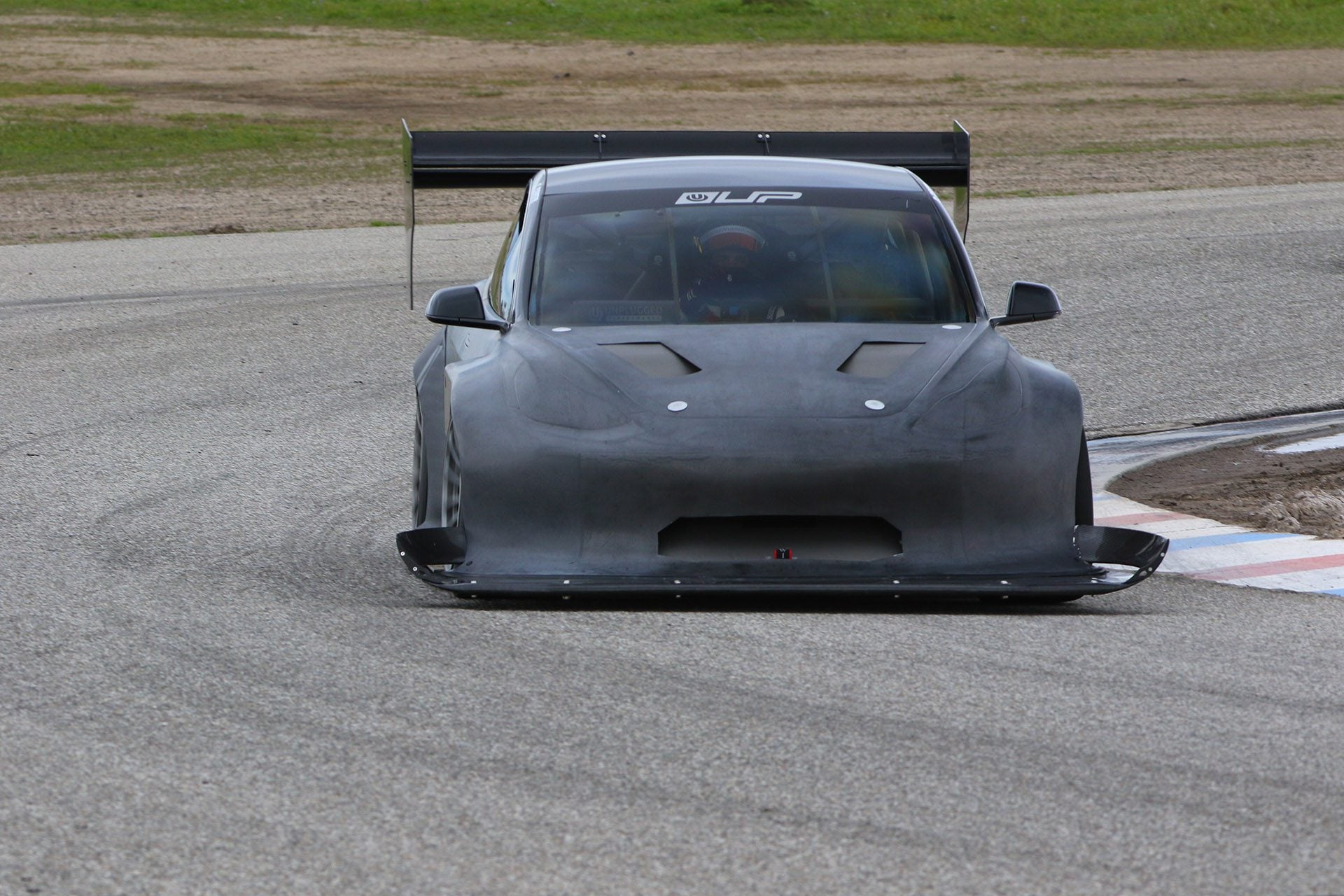 Unplugged Performance Tesla Model 3 “Bionic Phoenix” Race Car