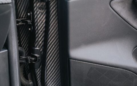 Unplugged Performance Tesla Model 3 With Dry-Carbon Fiber Doors