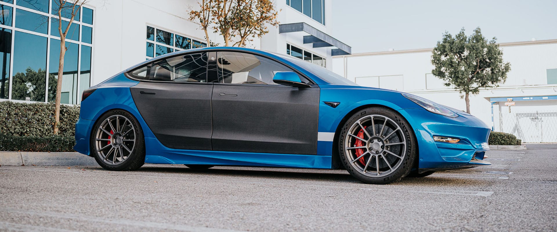 Unplugged Performance Tesla Model 3 With Dry-Carbon Fiber Doors and UP-03 Wheels