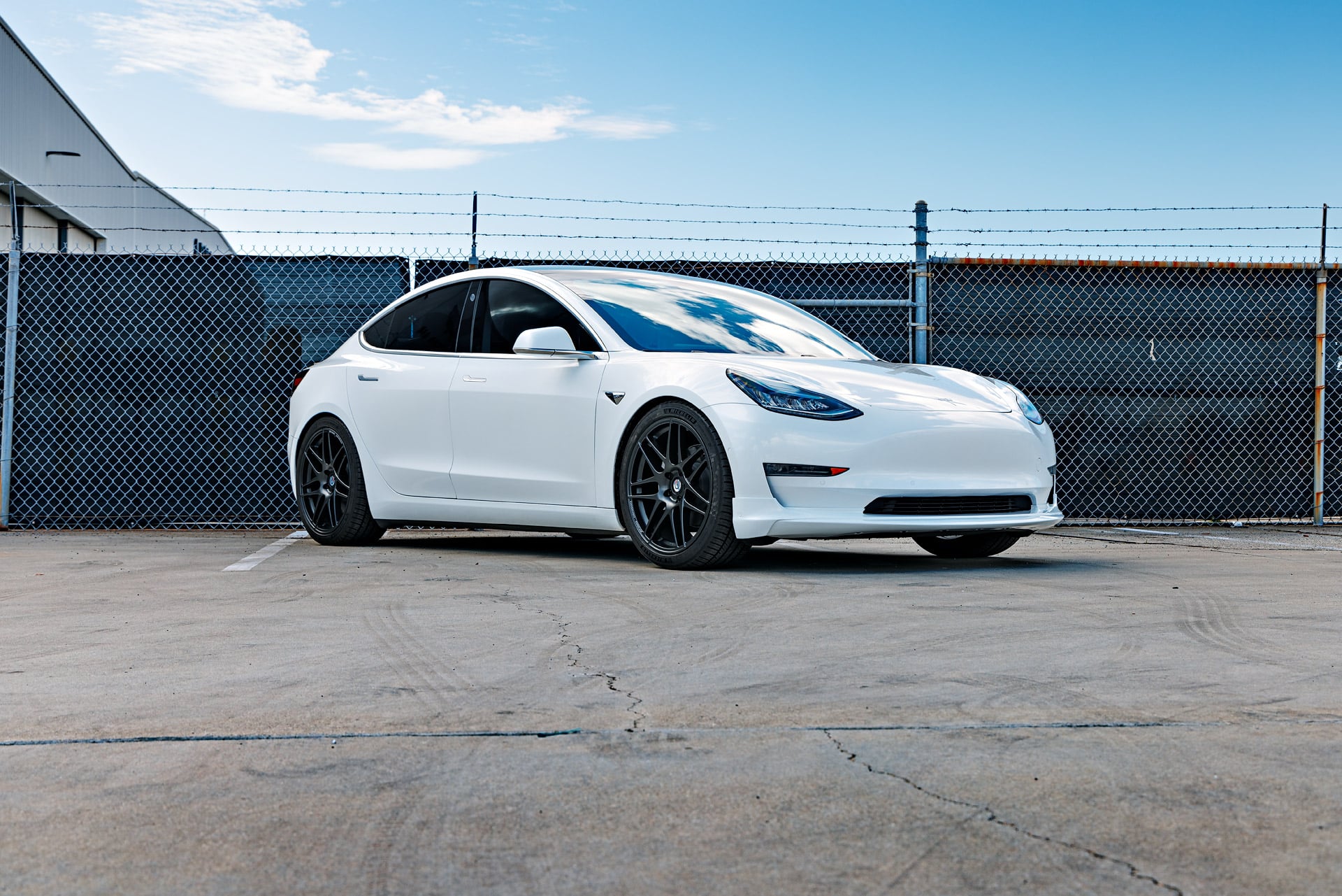 White Tesla Model 3 with 20 inch UP x BBS Flugplatz Wheels and UP Front Lip Spoiler